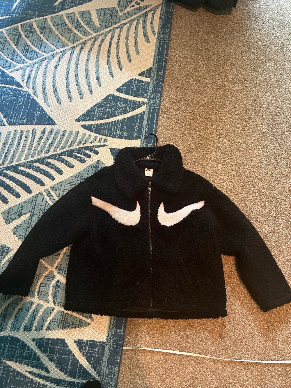 Nike Black Sherpa Puffer Jacket with White Swoosh Accents